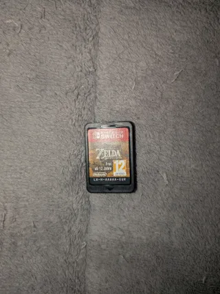 Pacchetto Nintendo Switch OLED Zelda + 4 Giochi