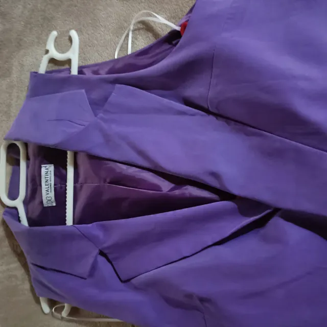 Chaleco Morado con Botones Naranja Talla M.