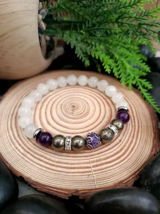 Pulsera elástica piedras blancas y moradas