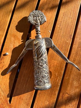 Antico cavatappi con figura