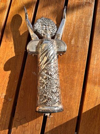 Antico cavatappi con figura