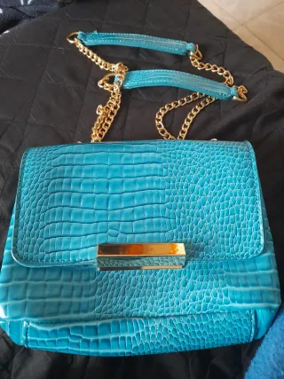 Borsa Carpisa con tracolla oro