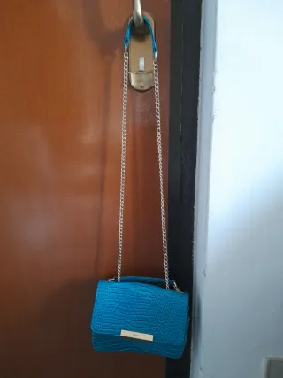 Borsa Carpisa con tracolla oro