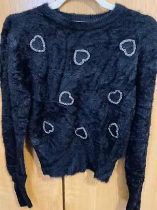Jersey negro pelo con corazones brillantes