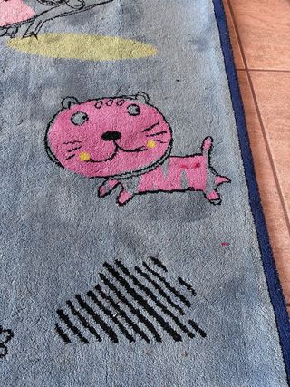 Alfombra infantil azul con dibujos
