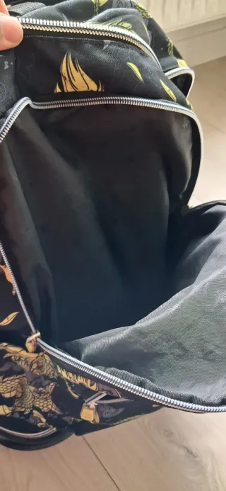 Mochila escolar Totto con ruedas y diseño dragón