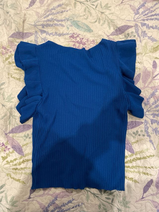 Top azul con volantes talla única