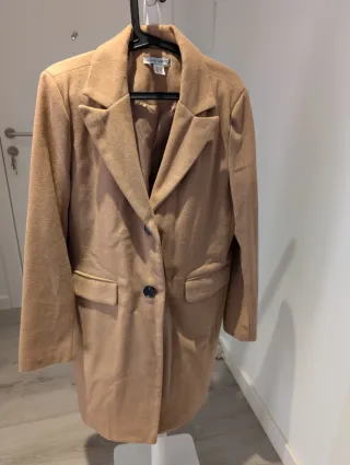 Abrigo de paño beige