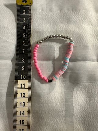 Bracciale perline rosa e azzurro con stella