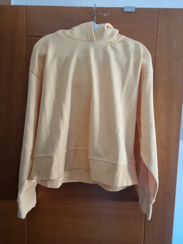 Sudadera naranja melocotón con capucha