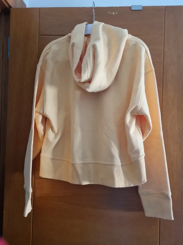 Sudadera naranja melocotón con capucha