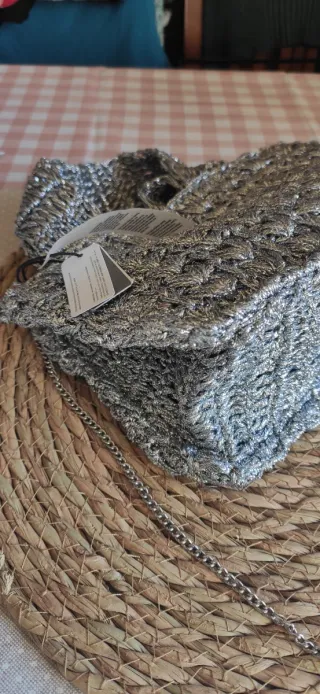 Bolso de fiesta plateado.Nuevo Parfois