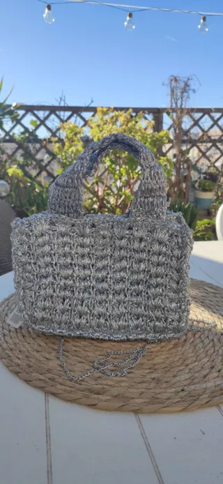 Bolso de fiesta plateado.Nuevo Parfois