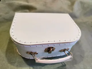 Muñeca reborn 20 cm con accesorios