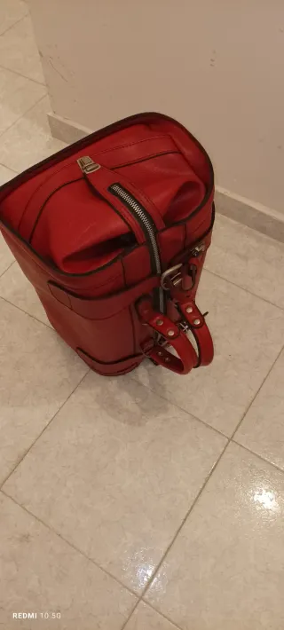 Bolso de viaje rojo de cuero años 60 antiguo