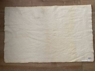 Alfombra de baño beige de tela