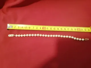 Pulsera de perlas dorada