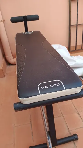 Banco, barra olímpica y discos Salter