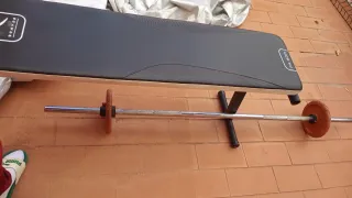 Banco, barra olímpica y discos Salter