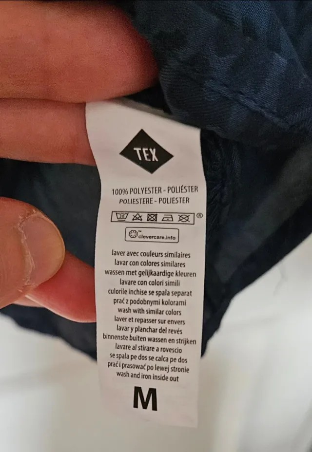 Blusa TEX azul estampada. Talla M