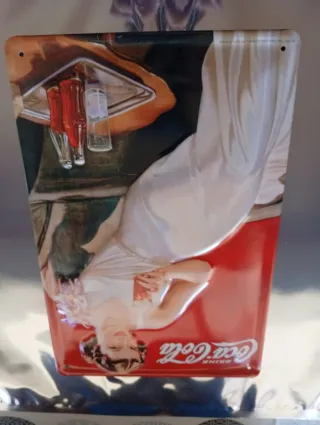 Cartelli pubblicitari in metallo Coca-Cola