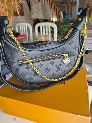 Bolso Louis Vuitton Negro y Dorado