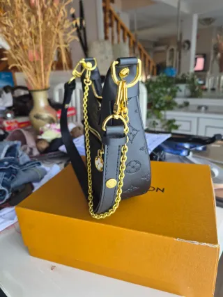 Bolso Louis Vuitton Negro y Dorado