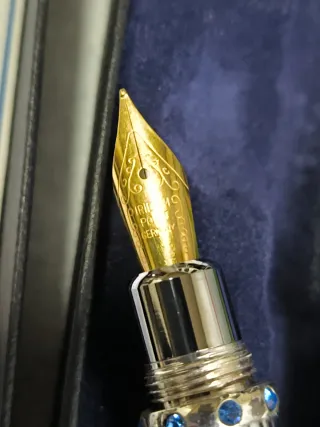 Pluma Hachette Swarovski 24k oro