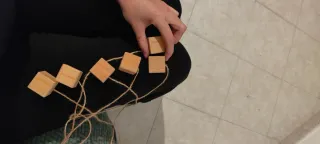 Portafoto con corda in legno e metallo