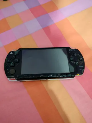 PSP + Batería + Tarjeta 4GB