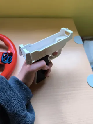 Accesorios Wii: Volante y Pistola