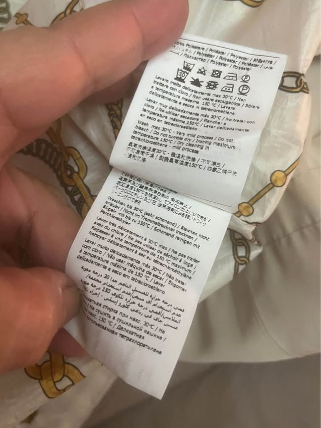 Spolverino beige con stampa catene