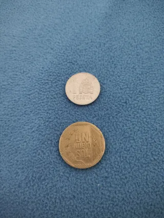 2 Monedas: 1 Peseta y 1 Nuevo Sol