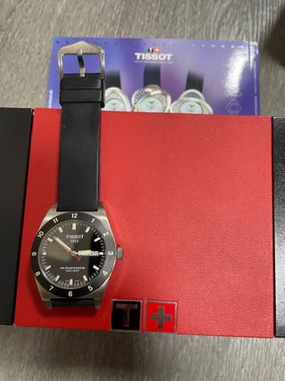 Reloj Tissot Automático Negro y Plateado
