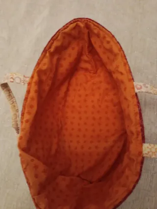 Muñeca bebé con cuco y pijama rayas