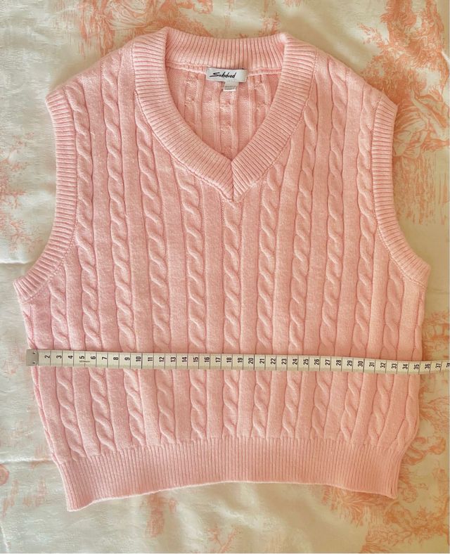 Chaleco de punto rosa subdued