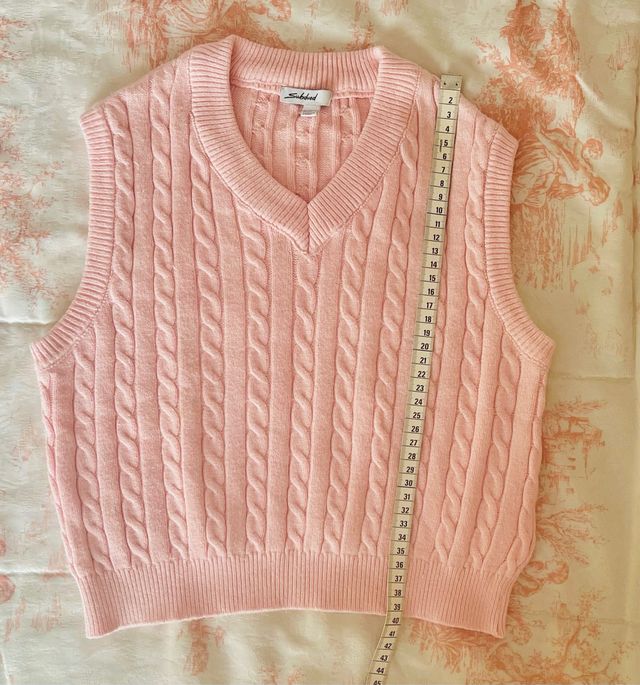 Chaleco de punto rosa subdued