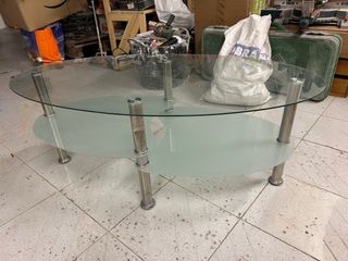 Mesa de salón cristal y metal ovalada