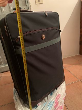 Valigia verde bottiglia e marrone