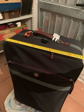 Valigia verde bottiglia e marrone