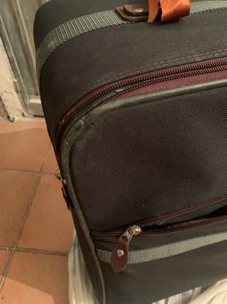 Valigia verde bottiglia e marrone