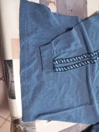 Maglia sportiva Asics blu con zip