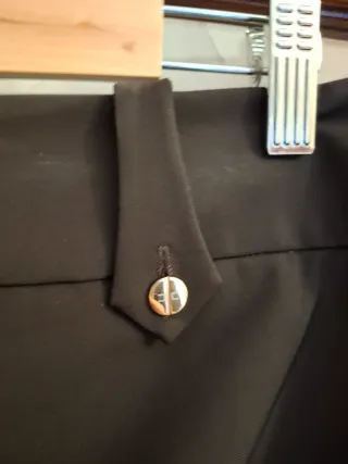 Pantaloni donna neri con dettagli oro