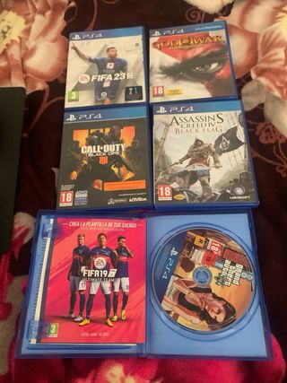PS4 Slim Negra + 2 Mandos + 5 Juegos