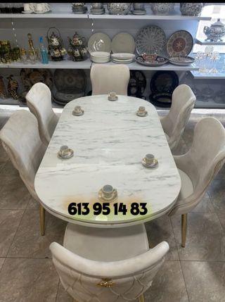 Mesa ovalada con 6 sillas