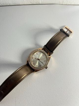 Reloj con pulsera a juego