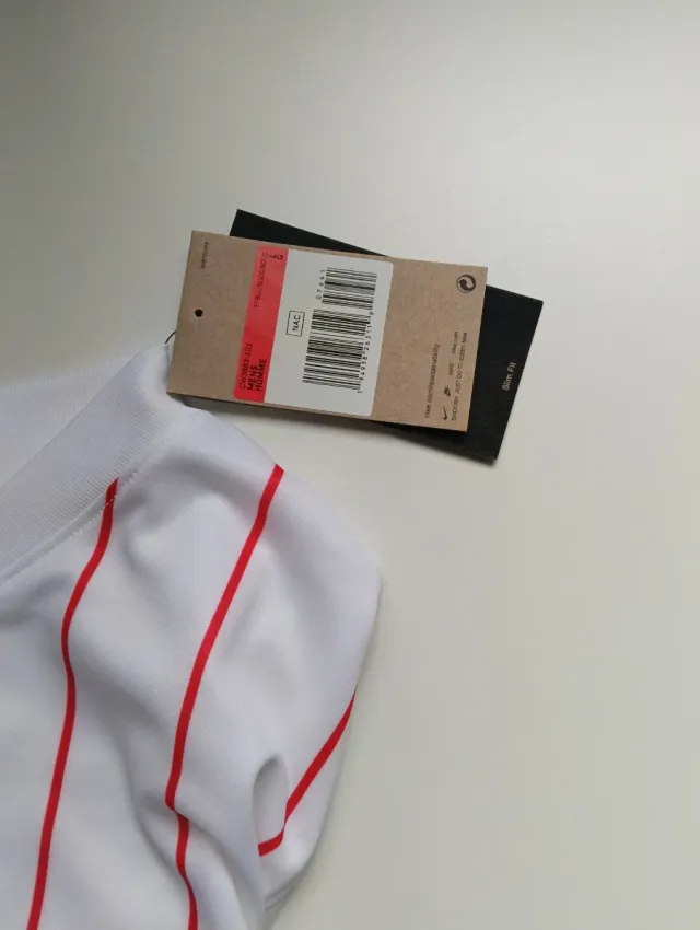 Camiseta deportiva (L) Nike blanca con rayas roja