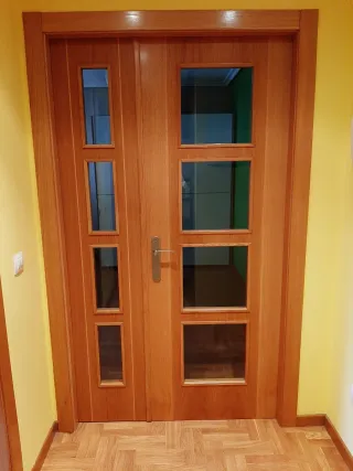 Puerta interior roble con manilla de acero