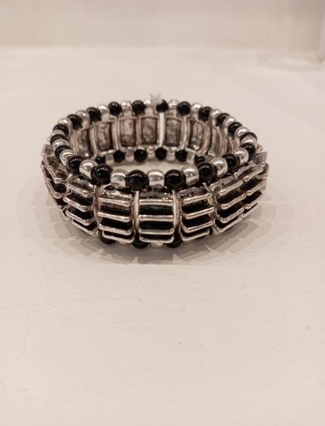 Bracciale rigido nero e argento