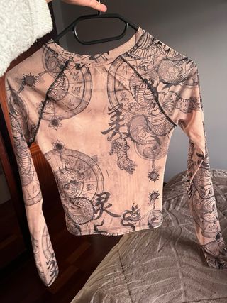 Top Bershka transparente estampado XS